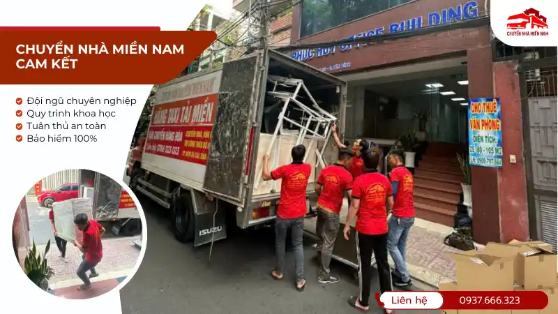 Đội ngũ kubet phòng đang xếp đồ vào xe tải bên ngoài một tòa nhà.
